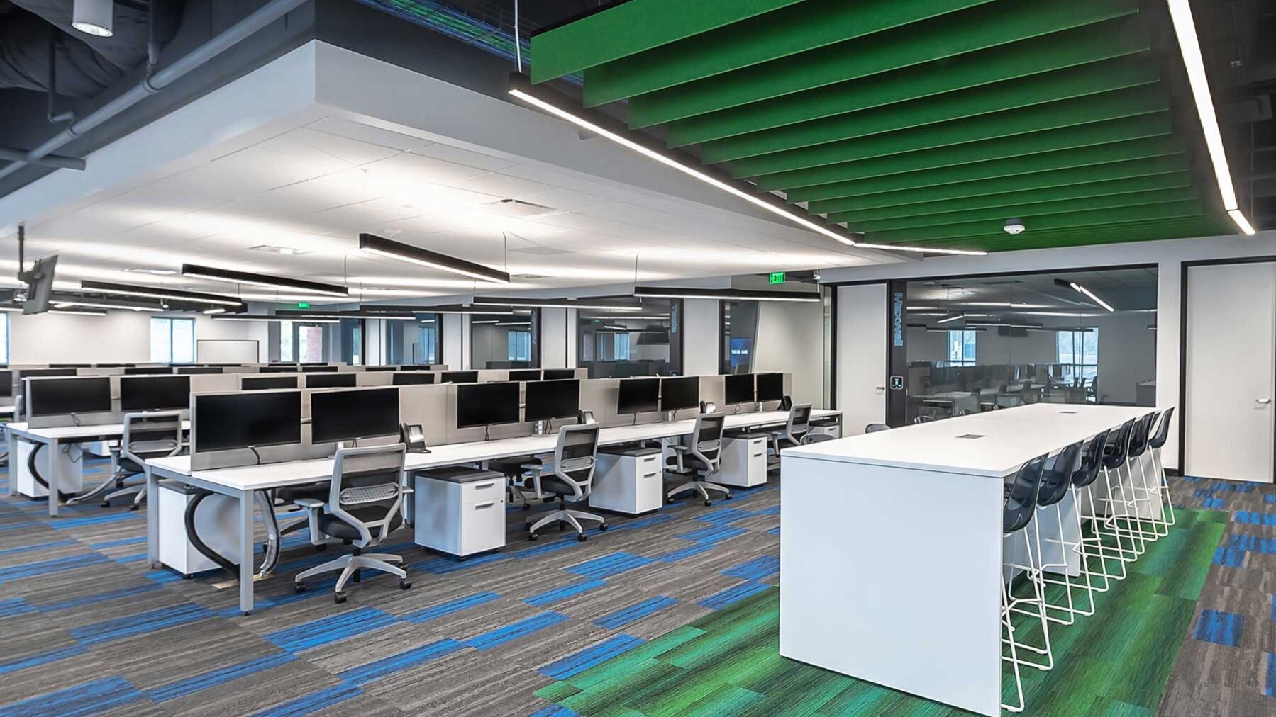 Suspended linear lighting installed at Synergy